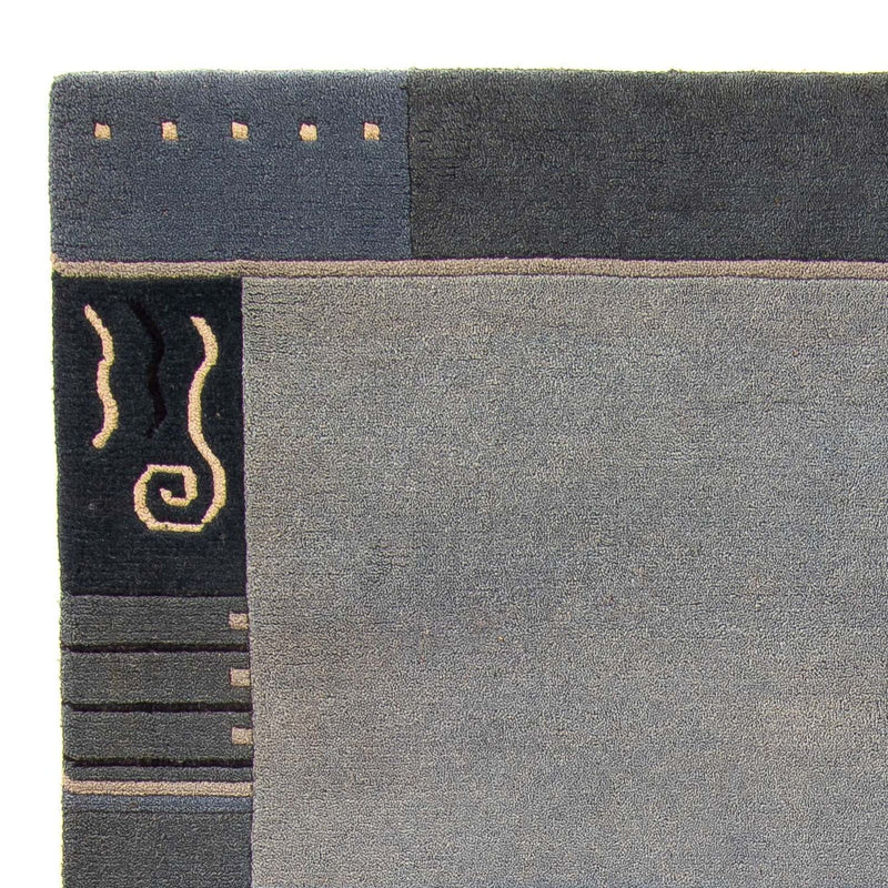 Nepal Teppich 240 x 170 cm - hellblau